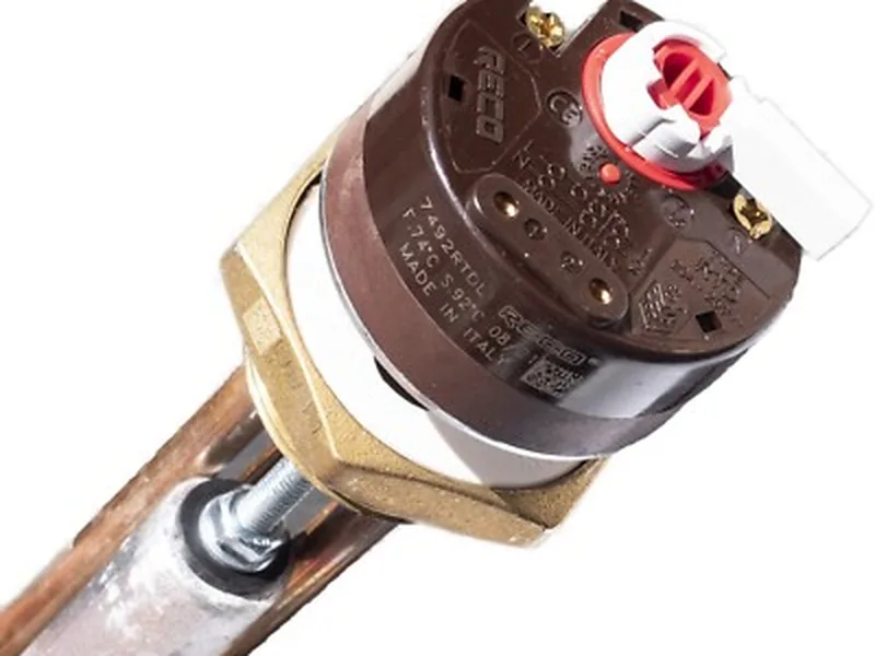 Technician testing water heater thermostats with a multimeter in Guadalupe, AZ 85283