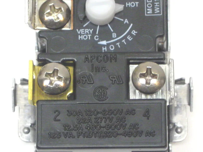 Technician testing water heater thermostats with a multimeter in Sun Lakes, AZ 85248